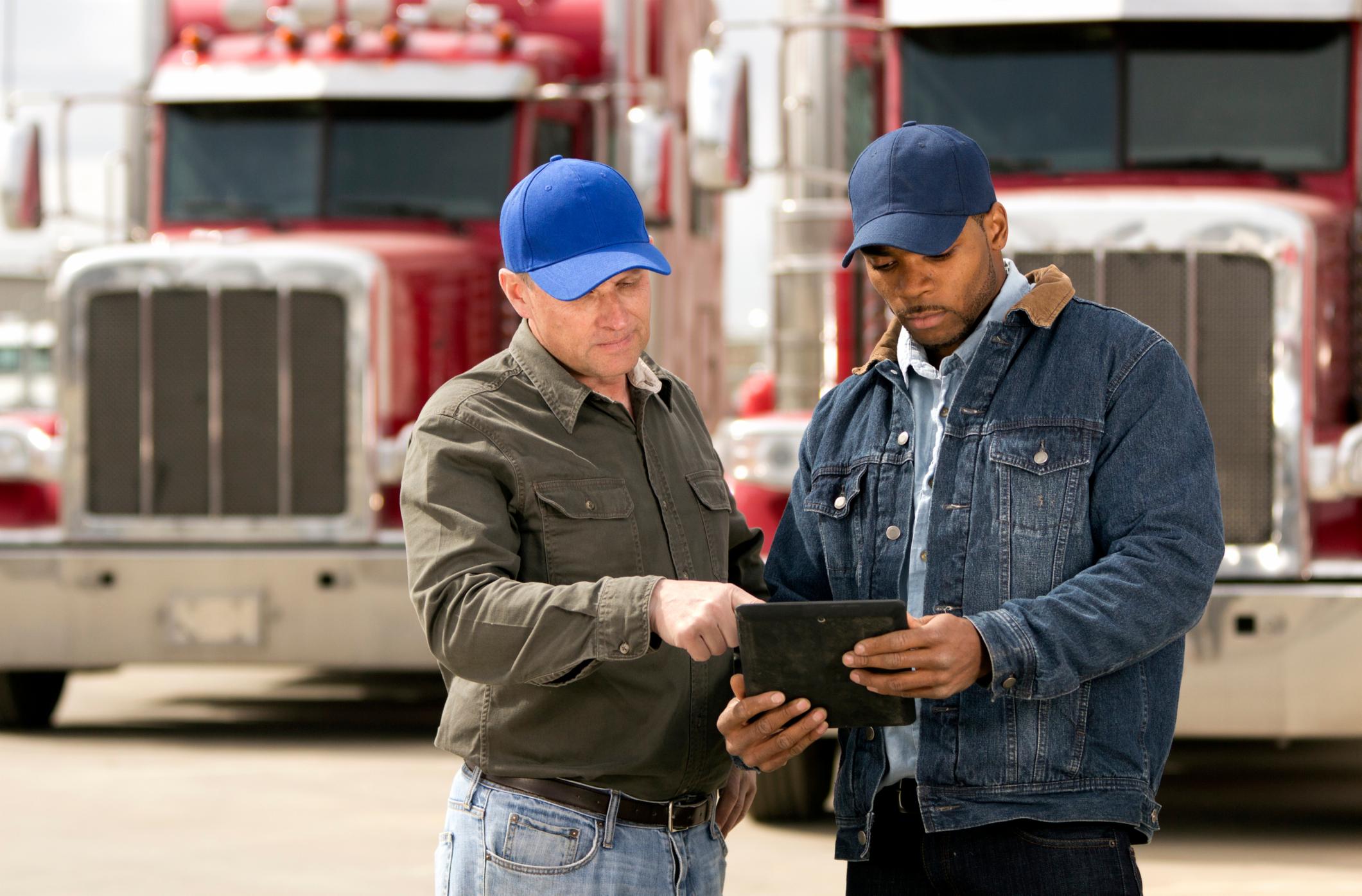 Two men talking about safety 