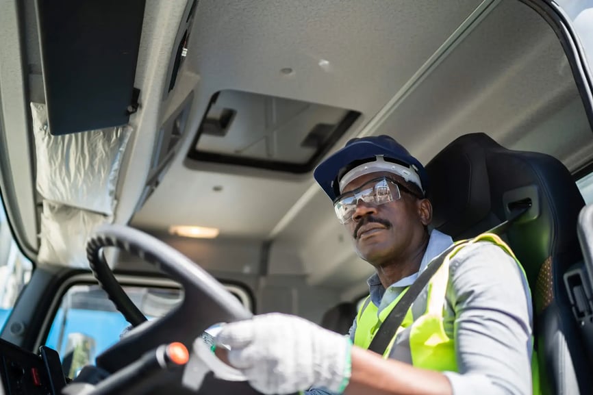 Trucker drives while wearing hi-vis vest