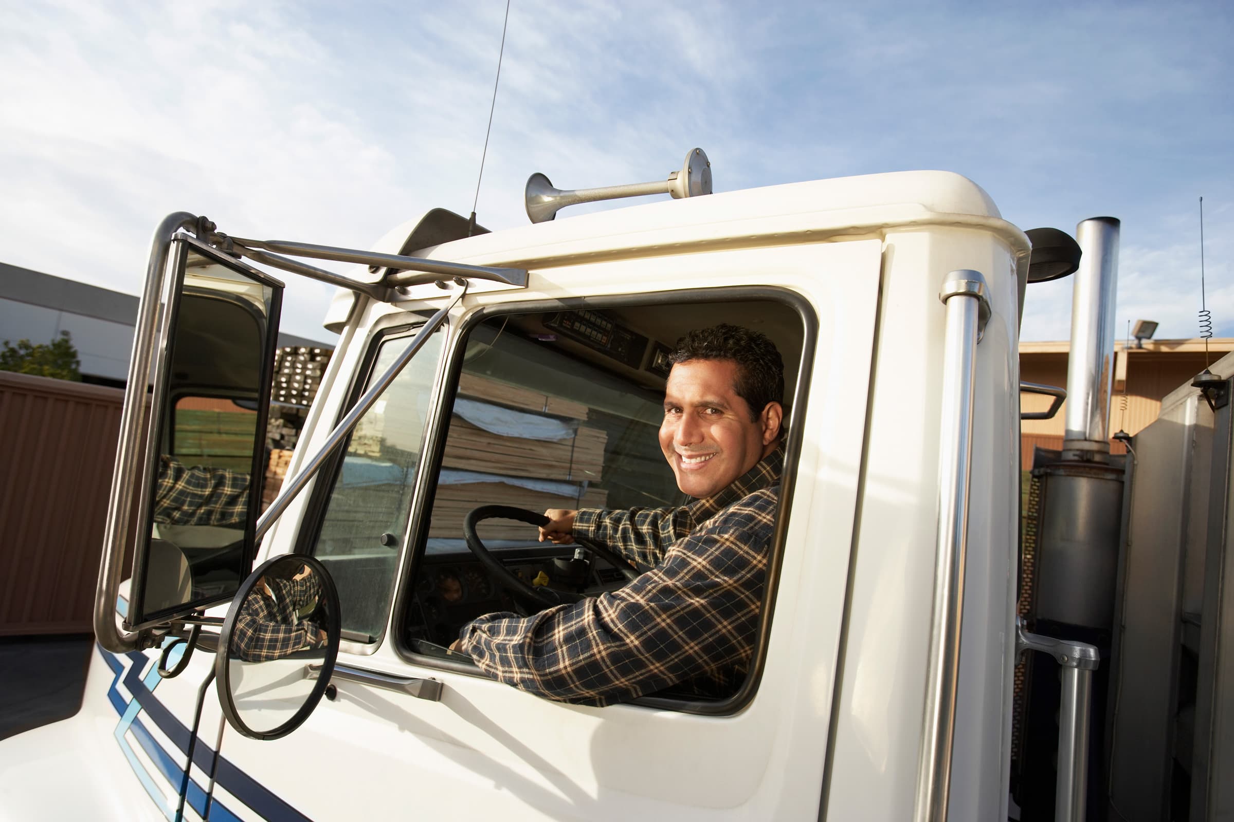 Truck Driver Behind The Wheel