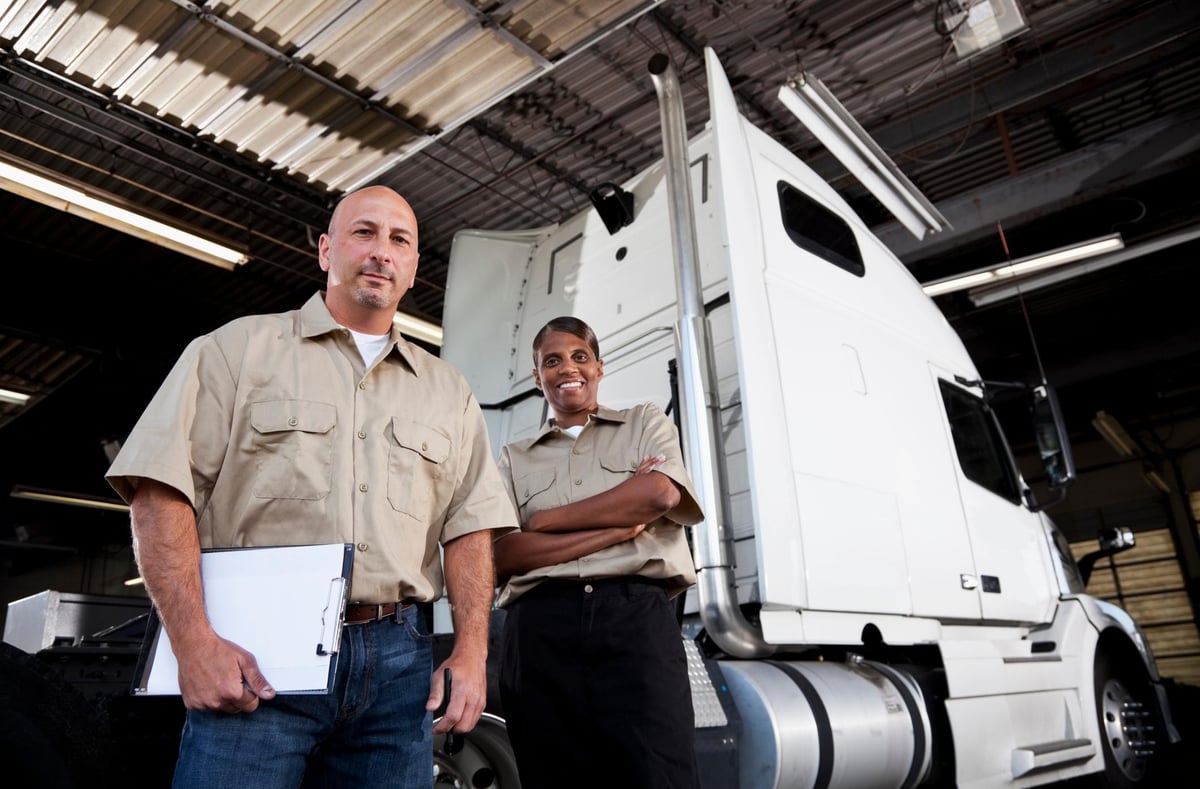 man and woman with truck 